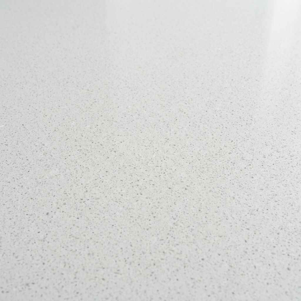 Polished engineered quartz countertop slab showing its uniform speckled pattern